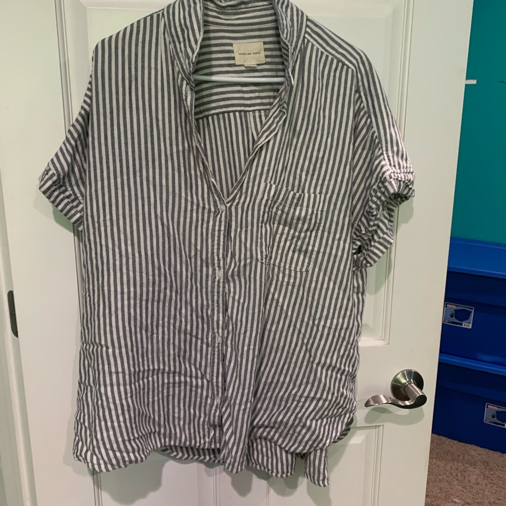 Barely worn button up short sleeve stripe shirt .